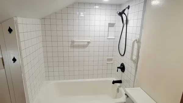 White square tile bathroom renovation